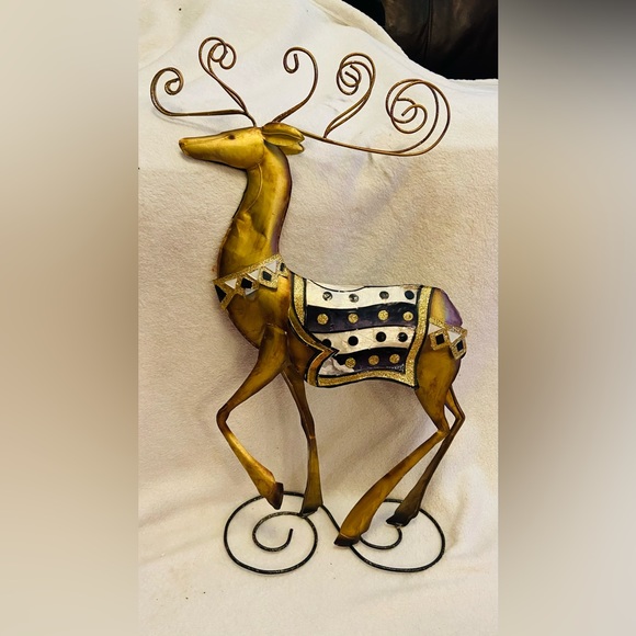 Source Unknown Other - Holiday Decor Reindeer in Gold with black and cream accents. Made of Metal.
